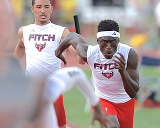 Jeff Lange | The Vindicator  JUNE 6, 2015 - Austintown Fitch's Savon McWreath (left) hands off the baton to Earl Scott in the boys 4x200 meter relay during Saturday's 2015 state track and field tournament held at Jesse Owens Memorial Stadium in Columbus.