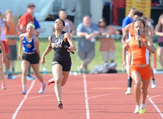 Jeff Lange | The Vindicator  JUNE 6, 2015 - Warren Harding's Justice Richardson (5) sprints the final 100 meters of the 4x100 meter relay in Saturday's 2015 state track and field tournament held at Jesse Owens Memorial Stadium in Columbus.