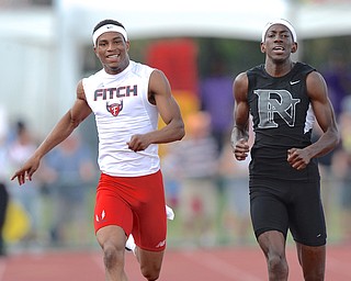 Jeff Lange | The Vindicator  JUNE 6, 2015 - Austintown Fitch's Joe Harrington (left) grins as he approaches the finish line with Nick Gray of Pickerington North in the boys 200 meter dash during the 2015 state track and field tournament held at Jesse Owens Memorial Stadium in Columbus, Saturday afternoon.