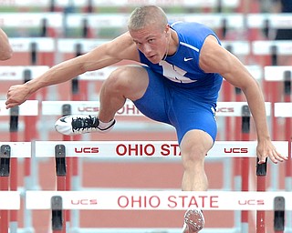 Jeff Lange | The Vindicator  JUNE 6, 2015 - Warren JFK's Chad Zallow clears a hurdle during the DIII boys 110 meter hurdles event during the 2015 state track and field tournament held at Jesse Owens Memorial Stadium in Columbus.
