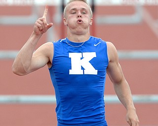 Jeff Lange | The Vindicator  JUNE 6, 2015 - Chad Zallow of Warren JFK raises his finger in victory after capturing first place in the DIII boys 110 meter hurdles during Saturday's 2015 state track and field tournament held at Jesse Owens Memorial Stadium in Columbus.