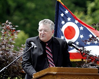       .         ROBERT  K. YOSAY | THE VINDICATOR.. commencement speaker   Atty John Britton..Canfield High School Graduation on the football field in Canfield..-30-