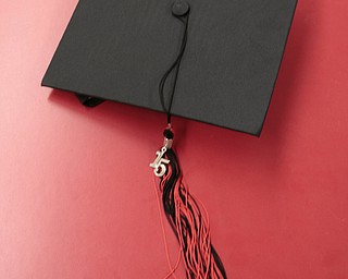       .         ROBERT  K. YOSAY | THE VINDICATOR..a hat sits on a table awaiting the start of graduation ..Canfield High School Graduation on the football field in Canfield..-30-