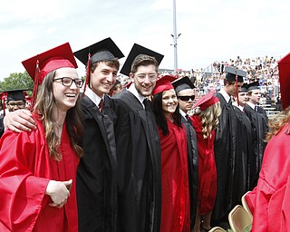       .         ROBERT  K. YOSAY | THE VINDICATOR..Singing the alma mater one last time..Canfield High School Graduation on the football field in Canfield..-30-