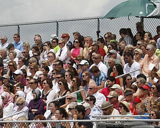       .         ROBERT  K. YOSAY | THE VINDICATOR..proud parents and friends listen as the names of graduates are announced.Canfield High School Graduation on the football field in Canfield..-30-