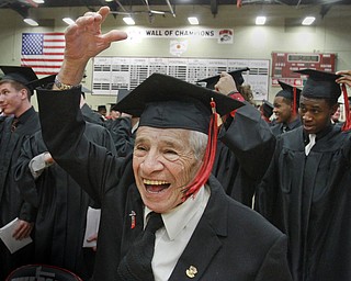 William D Lewis  Ray Ornelas reacts after being award a diploma Sunday at Struthers HS graduation. He was one of several veterans awarded diplomas. They did not graduate with their classes because of military service.