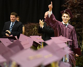BOARDMAN, OHIO - JUNE 7, 2015: William Zupko celebrates after being the last student to receive his diploma smiles after receiving his diploma during the Boardman High School commencement ceremony Sunday Afternoon at Boardman High School. (Photo by David Dermer/Youngstown Vindicator)