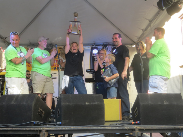The BurgerGuyz present the coveted People’s Champion Award to The New Manhattan of Hubbard.