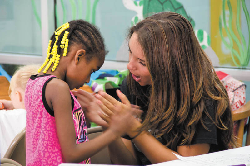 SPECIAL TO THE VINDICATOR
The Autism Society of Ohio has expanded its summer day camp program, Camp F.R.I.E.N.D.: Finding Rewards In Every New Day. The camps will take place Aug. 3 through 7 and 10 through 14 at the Central YMCA, 17 N. Champion St. in downtown Youngstown. Each of the five age-based groups will be led by a certified teacher, assisted by an experienced paraprofessional aide and a high school peer. Each group will feature related social skills topics: ages 3 to 5, friendship skills; 7 to 10, teamwork; 10 to 12, game-o-rama; 13 to 16, friendly competition; and 17 to 22, community integration. Above, on the right is Olivia Proia, a high school volunteer, with Shamir Moore.



