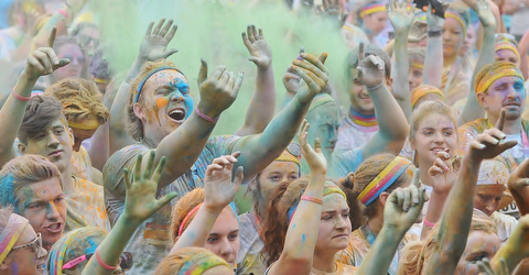 Jeff Lange | The Vindicator  JUNE 13, 2015 - McDonald High School senior Matt Howard (left center) screams and dances with other runners of the 2015 Color Run in Youngstown, Saturday afternoon.
