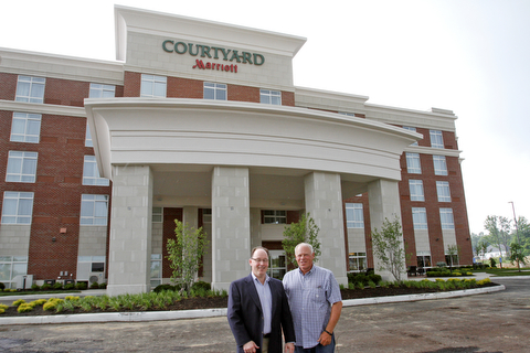        ROBERT K. YOSAY  | THE VINDICATOR..Scott Yeager and Chuck Whitman...At Kensington in Canfield..The 110-room Courtyard by Marriott hotel will open this month. Chuck Whitman of CTW Development is the man behind bringing the hotel to the area...