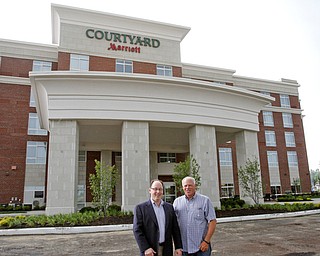        ROBERT K. YOSAY  | THE VINDICATOR..Scott Yeager and Chuck Whitman...At Kensington in Canfield..The 110-room Courtyard by Marriott hotel will open this month. Chuck Whitman of CTW Development is the man behind bringing the hotel to the area...