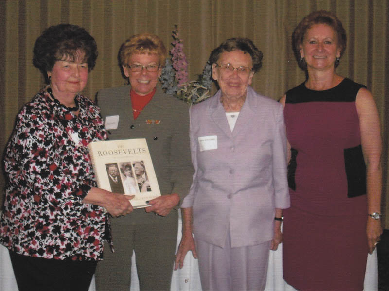 SPECIAL TO THE VINDICATOR
The Mahoning Retired Teachers Association recently gathered for its annual “In Memoriam” program at Antone’s Banquet Center in Boardman. Mahoning County educators who died from 2014 to 2015 were remembered. A book, “The Roosevelts ... An Intimate History,” by Geoffrey C. Ward and Ken Burns, has been purchased on behalf of the John M. Knapick Memorial in honor of deceased MRTA members and has been donated to the Public Library of Youngstown and Mahoning County. Among those who honored the deceased members are, from left, Sally Knapick Winsen, In Memoriam chairwoman; Susan Harris, acting MRTA president; Mary Jane Lewis, historian; and Martha Lopez, remembrance chairwoman.