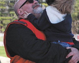 This is Tommy Christmas and his son, Thomas Christmas III, 6, both of Boardman, was taken at a drag strip. Thomas says his dad is better than Superman, and he plays nerf ball. Submitted by Thomas III and his babysitter, Lisa.