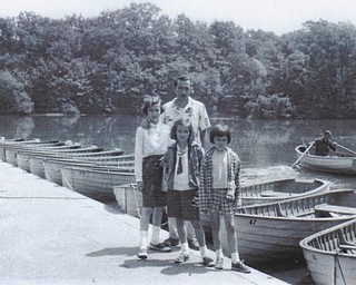 This photo was taken in 1957 of Stanley M. Hewitt of Youngstown, and his daughters at Lake Newport in Mill Creek Park. His daughters are Barbara Cardarelli of Struthers, Linda Hulewat of Lake Havasu City, Ariz., and Phyllis Murphy of Youngstown. He and his daughters are graduates of Chaney High School. Cardarelli says her father put his wife and children first and was always there for them. Hewitt now lives at Park Vista Assisted Living Center. Submitted by Murphy.