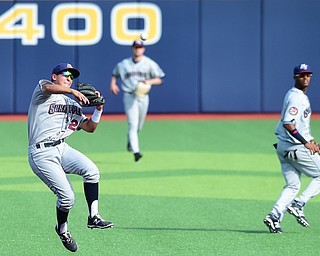 MORGANTOWN, WEST VIRGINIA - JUNE 21, 2015: Second basemen Mark Mathias #29 of the Scrappers flies through the air while throwing the baseball to 1st in the bottom of the 4th inning during game two of Sunday afternoons double header at game at Monongalia County Ballpark. DAVID DERMER | THE VINDICATOR