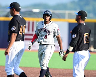 MORGANTOWN, WEST VIRGINIA - JUNE 21, 2015: Batter Emmanuel Tapia #6 of the Scrappers walks back to the dugout after grounding into a game ending double play in the top of the 7th inning during game two of Sunday afternoons double header at game at Monongalia County Ballpark. DAVID DERMER | THE VINDICATOR