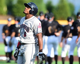 MORGANTOWN, WEST VIRGINIA - JUNE 21, 2015: Batter Emmanuel Tapia #6 of the Scrappers walks back to the dugout after grounding into a game ending double play in the top of the 7th inning during game two of Sunday afternoons double header at game at Monongalia County Ballpark. DAVID DERMER | THE VINDICATOR