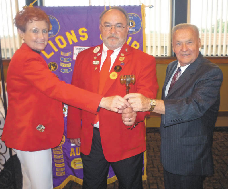 SPECIAL TO THE VINDICATOR
Austintown Lions and Lioness Clubs hosted a joint installation night June 8 at Rachel’s Restaurant in Austintown as King Lion John Susany presided. Vice District Gov.-elect Wayne Christen of the Calcutta Lions Club served as the installing officer. It was also the 38th Charter Night for the Austintown Lions. Susany was installed as president of the Lions, and Lori Stone was installed as president of the Lionesses. A highlight of the evening was the presentation of the Melvin Jones Fellowship Award to Harold Wilson and John Facemyer. Presenting the awards was Past District Gov. Bob Booher of the Canal Fulton Lions Club, who is the chairman of the District Lions Clubs International Foundation. The award symbolizes dedicated humanitarian service and is a high honor. Above, Christen, center, presents the gavel to incoming presidents Stone and Susany. Below are Kay and Harold Wilson, Booher, and Bob and Barbara Facemyer.
Other Lions officers installed were Bob Melcher, first vice president; Jack Kochansky, second vice president; Harold Wilson, secretary; Larry Jensen, treasurer; Jim Banyots, tail twister; Don Hoelzel, Lion tamer; Bob Whited, membership and public relations past district governor; Facemyer, one-year director; Glenn Ringer, two-year director; and Jensen, Lioness liaison. Other Lioness officers installed were Lou Skerkavich, vice president; Teresa McCallen, secretary; and Jane Grace, treasurer.