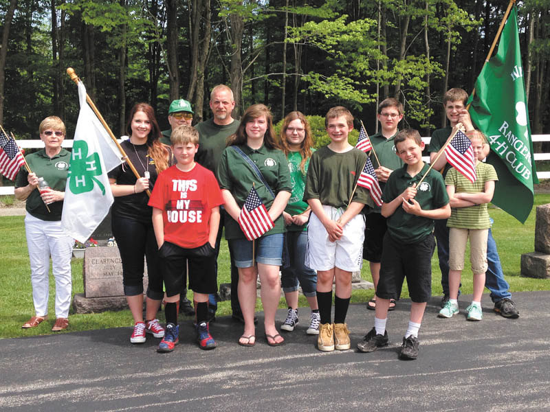 SPECIAL TO THE VINDICATOR
Members and advisers of the Western Reserve Rangers 4-H Club marched in the Berlin Township Memorial Day Parade. In front from left are Josh Stamp, Abby Schors, Dylan Fair and Logan Fair. In back are Kathleen Moser, Shannon Marshburn, Jan Moser, Steve Reph, Rachel McBride, Collin Meehan, Thomas Collins and Evelyn Collins. Members of the 4-H Club who marched in the band are Emma Reph, Olivia Reph, William Reph, Isabel Schors, Bailey Hornberger, Brianna Herman, Levi Smith, Emily Smith, Ian Hames and Richie Hedrick. The next club meeting will take place at 7 p.m. July 9 at the Ellsworth Fire Hall.