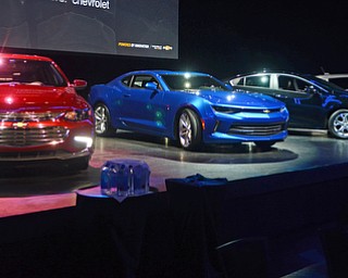 Katie Rickman | The Vindicator.Featured are new 2016 Chevrolet vehicles (L-R) Malibu, Camero, Volt, and Spark. The 2016 Cruze will be unveiled tomorrow.