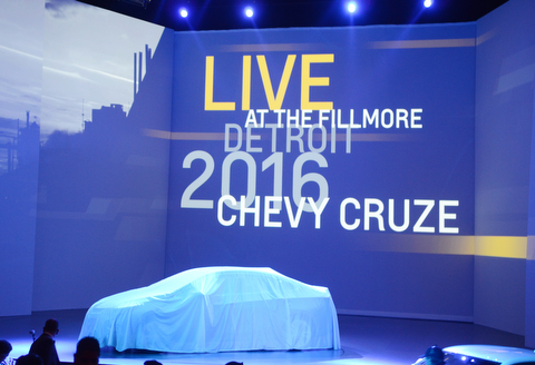 Katie Rickman | The Vindicator.Hundreds eagerly await the unveiling of the 2016 Cruze at The Fillmore Detroit on June 24, 2015. The new cruise offers features such as more room, a lighter body, hands-free and much more.