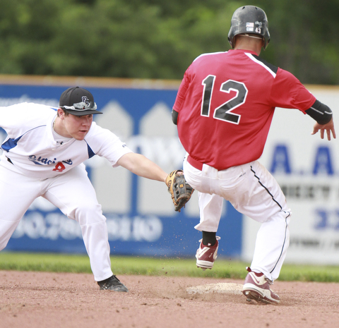 William D. Lewis The Vindicator  Glaciers Luke Baranchak(8)  tries to tag Troy's Greg Johnson(12) as he steals 2nd during 6-25-15 game at Cene.