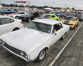William D Lewis The Vindicator  Cars and drivers wait their turn to drag race at Super Nats in Salem Friday 6-26.