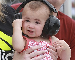 William D Lewis The Vindicator  Karly Collins wears ear protection while waiting to see her dad Clinton Collins drag race  at Super Nats in Salem. She is 11 months old