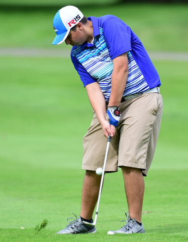 HUBBARD, OHIO - JUNE 26, 2015: Kevin Baker of McDonald chips his ball toward the green on his approach shot on the 18th hole Friday afternoon at Pine Lakes during a Vindy Greatest Golfer qualifying Tournament. DAVID DERMER | THE VINDICATOR