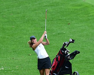 HUBBARD, OHIO - JUNE 26, 2015: Cheyenne Titus of McDonald follows through on her approach shot on the 13th hole Friday afternoon at Pine Lakes during a Vindy Greatest Golfer qualifying Tournament. DAVID DERMER | THE VINDICATOR