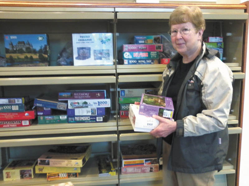 SPECIAL TO THE VINDICATOR
Kathy Strelko recently exchanged two puzzles at the Leetonia Community Public Library, 181 Walnut St. The puzzles are located in the library’s magazine area. The public is welcome to exchange puzzles every day, and there is no limit on the number of puzzles guests can take from or bring to the exchange.