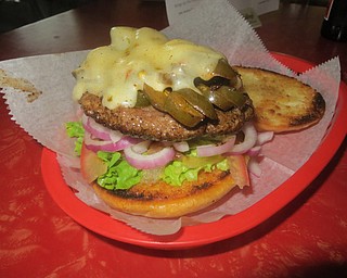 The Jalapeño Burger is just one of eight specialty burgers to choose from at Moe’s
Place in Masury.