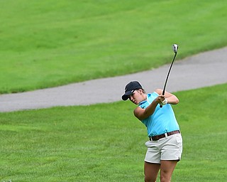 BOARDMAN, OHIO - JULY 1, 2015: Tori Augustine of Boardman follows through on her approach shot on the 8th hole at Mill Creek Golf Course Wednesday afternoon during a Vindy Greatest Golfer qualifying Tournament. DAVID DERMER | THE VINDICATOR