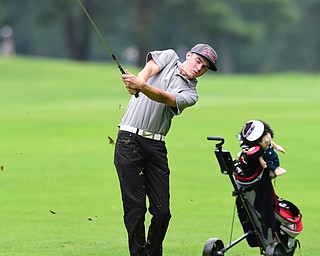 BOARDMAN, OHIO - JULY 1, 2015: Brian Oatridge of Fowler follows through on his approach shot on the 15th hole at Mill Creek Golf Course Wednesday afternoon during a Vindy Greatest Golfer qualifying Tournament. DAVID DERMER | THE VINDICATOR
