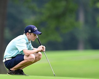 BOARDMAN, OHIO - JULY 1, 2015: Ryan Theis of Mineral Ridge reads the green before his putt on the 15th hole at Mill Creek Golf Course Wednesday afternoon during a Vindy Greatest Golfer qualifying Tournament. DAVID DERMER | THE VINDICATOR