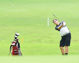 BOARDMAN, OHIO - JULY 1, 2015: Jimmy Fitzgerald of Canfield follows through on his approach shot on the 18th hole at Mill Creek Golf Course Wednesday afternoon during a Vindy Greatest Golfer qualifying Tournament. DAVID DERMER | THE VINDICATOR