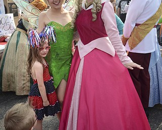 Katie Rickman | The Vindicator.Ava Lombardo 5 of Austintown smiles as she excited poses with Disney characters, her brother A.J. 2 stands nearby at the Austintown Fireworks Celebration July 3, 2015.