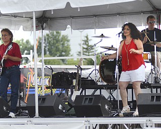 Katie Rickman | The Vindicator.The band Vegas plays at at the Austintown Fireworks Celebration July 3, 2015. The event featured several bands, various vehicles from Austintown Fire Dept., face painting and much more.