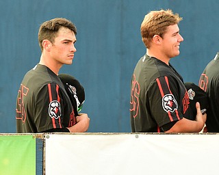 NILES, OHIO - JULY 4, 2015: Relief pitcher Tanner Scott #35 of the Ironbirds listens to the national anthem in the dugout before the start of Saturday nights game at Eastwood Field. DAVID DERMER | THE VINDICATOR