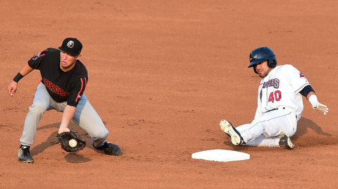 NILES, OHIO - JULY 4, 2015: Ki'ai Tom of the Scrappers slides into second base for a double beating the tag of Drew Turbin #32 of the Ironbirds in the 1st inning of Saturday nights game at Eastwood Field. DAVID DERMER | THE VINDICATOR