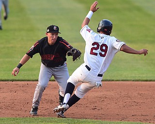 NILES, OHIO - JULY 4, 2015: Second basemen Drew Turbin #32 of the Ironbirds lunges to tag out baserunner Mark Mathias #29 of the Scrappers, who was attempting to steal second base in the 3rd inning of Saturday nights game at Eastwood Field. DAVID DERMER | THE VINDICATOR