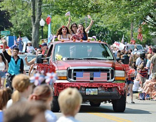 Jeff Lange | The Vindicator  JULY 4, 2015 - Members of Stage Left Dance Academy in Canfield bring on the patriotism as they parade, Saturday at the square in Canfield.
