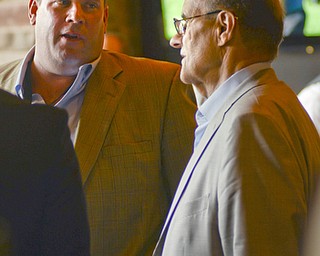 Katie Rickman | The Vindicator.Joel Bender of Volant, Pennsylvania on left speaks to Joe Torre at a meet and greet prior to The Magic of Michael benefit dinner at the Lake Club in Poland on July 5, 2015. Bender said that meeting Torre was a "once in a lifetime" event and that when he asked Torre what his favorite position was when he played [baseball] Torre answered catcher.