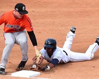 NILES, OHIO - JULY 5, 2015: Willi Castro #2 of the Scrappers steals third base beating the tag from 3rd basemen Austin Pfeiffer #23 of the Ironbirds in the 1st inning during Sunday afternoons game at Eastwood Field. DAVID DERMER | THE VINDICATOR