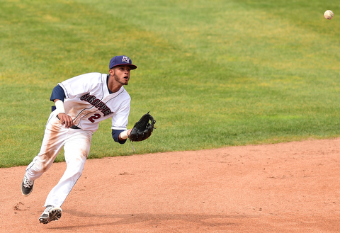 NILES, OHIO - JULY 5, 2015: Short stop Willi Castro #2 of the Scrappers charges in on the ball before throwing it to first in the 2nd inning during Sunday afternoons game at Eastwood Field. DAVID DERMER | THE VINDICATOR