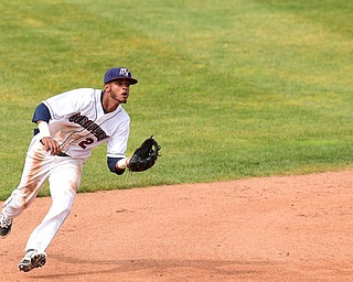 NILES, OHIO - JULY 5, 2015: Short stop Willi Castro #2 of the Scrappers charges in on the ball before throwing it to first in the 2nd inning during Sunday afternoons game at Eastwood Field. DAVID DERMER | THE VINDICATOR
