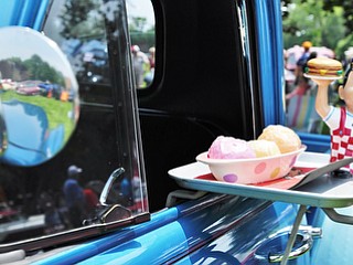 Jeff Lange | The Vindicator  JULY 5, 2015 - An iconic Big Boy figurine adorns a window tray on a classic 1954 GMC truck during Sunday's car show in Warren.