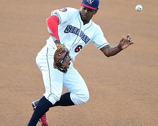 NILES, OHIO - JULY 6, 2015: First basemen Emmanuel Tapia #6 of the Scrappers misplays the baseball allowing it to bounce past him into right field in the 1st inning of Monday nights game at Eastwood Field. DAVID DERMER | THE VINDICATOR
