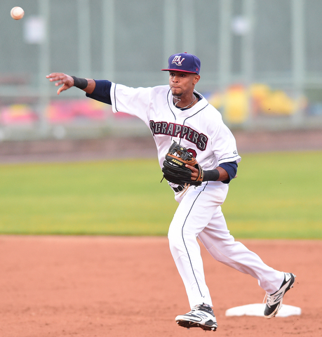 NILES, OHIO - JULY 6, 2015: Short stop Willi Castro #2 of the Scrappers throws the baseball to first for the out in the 2nd inning of Monday nights game at Eastwood Field. DAVID DERMER | THE VINDICATOR